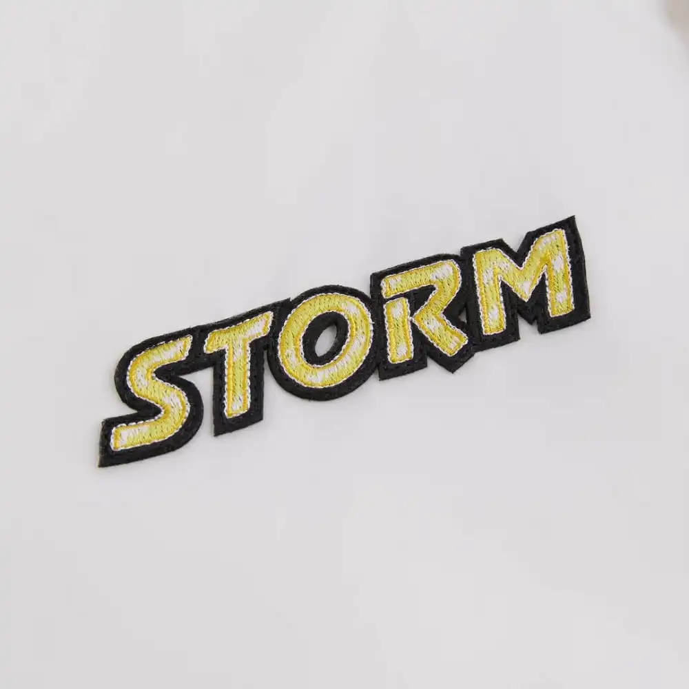 Kith x Marvel Jaqueta X-Men Storm Satin Bomber foto 3