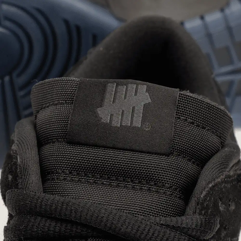 Undefeated x Nike Dunk Low 5 on It foto 7
