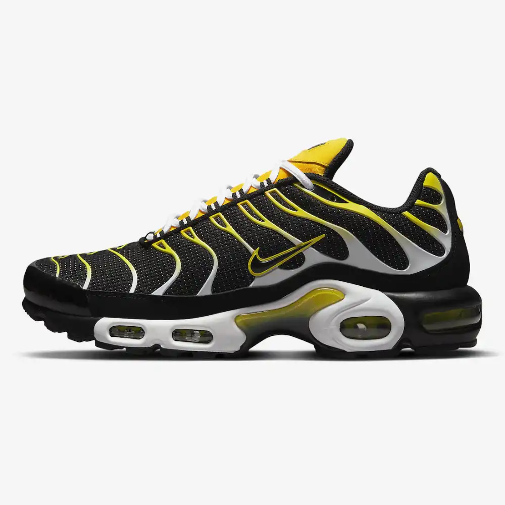 Nike sneakers black and sales yellow