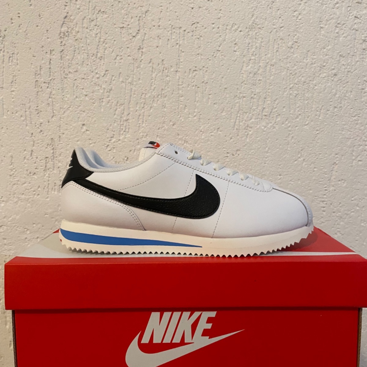 black and white cortez shoes